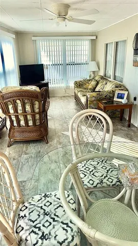 a living room with a couch and a table