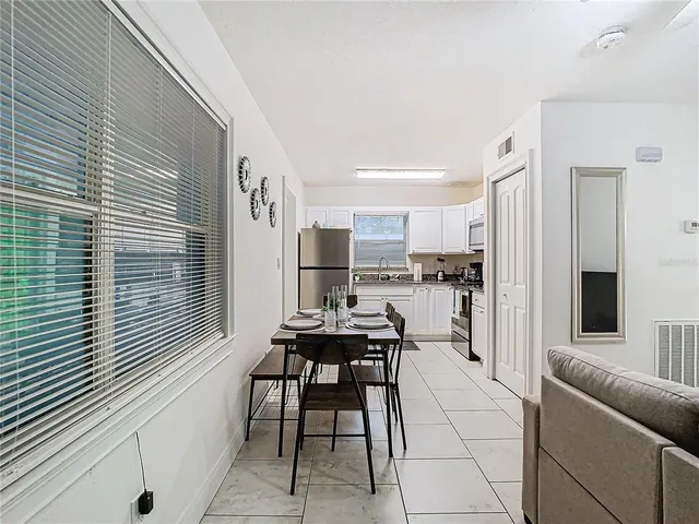 a view of a dining room with furniture
