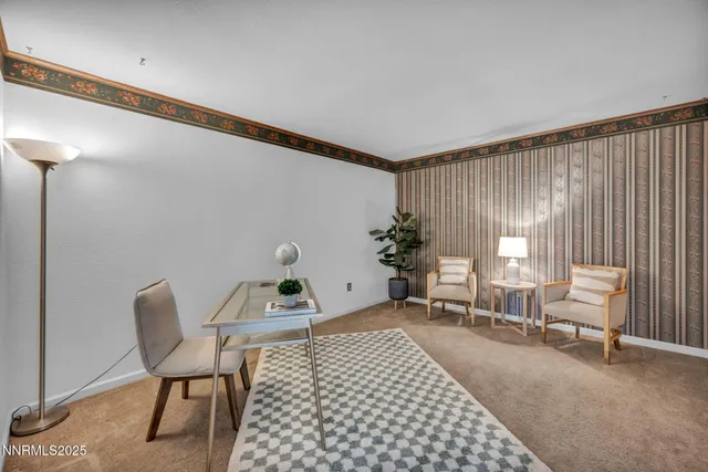 a living room with furniture and a table