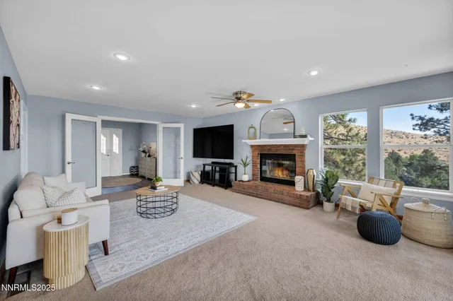 a kitchen that has a sink a refrigerator and a stove top oven