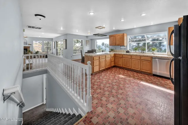 a bed room with bed and a large window
