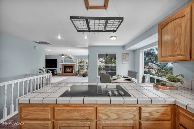 a bath tub sitting in a bathroom next to a window