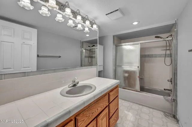 a view of a balcony with furniture