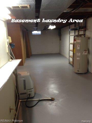 714 North State Street Howell, MI 48843 - Photo 18 of 27 Bsmt laundry area.jpg