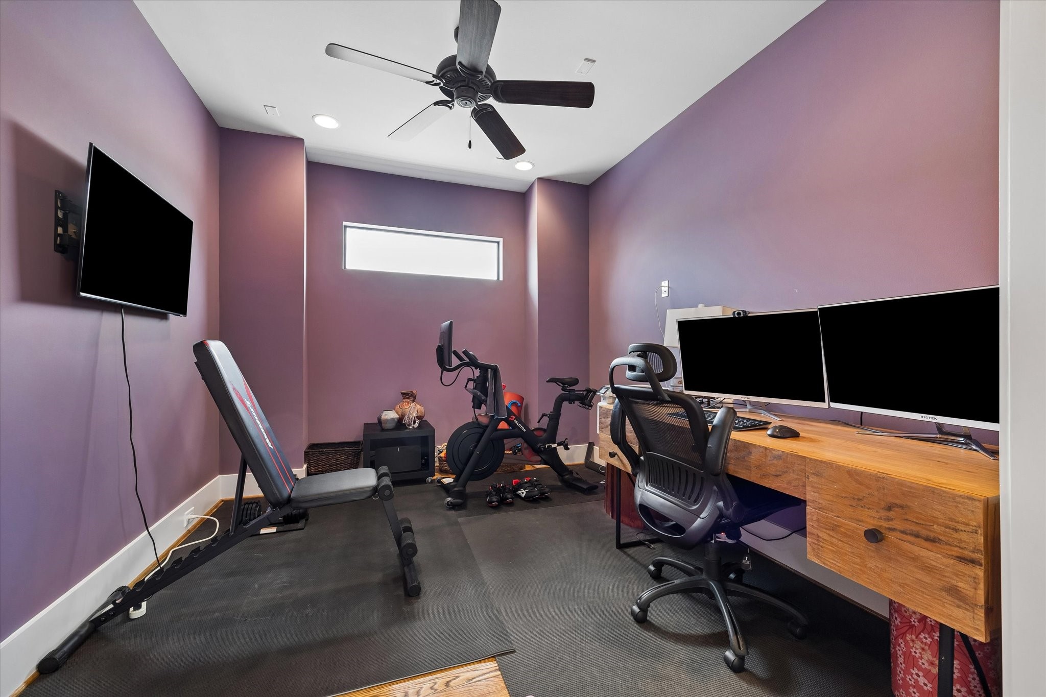 402 East 26th Street Houston, TX 77008 - Photo 27 of 35 a view of a workspace with furniture and a flat screen tv