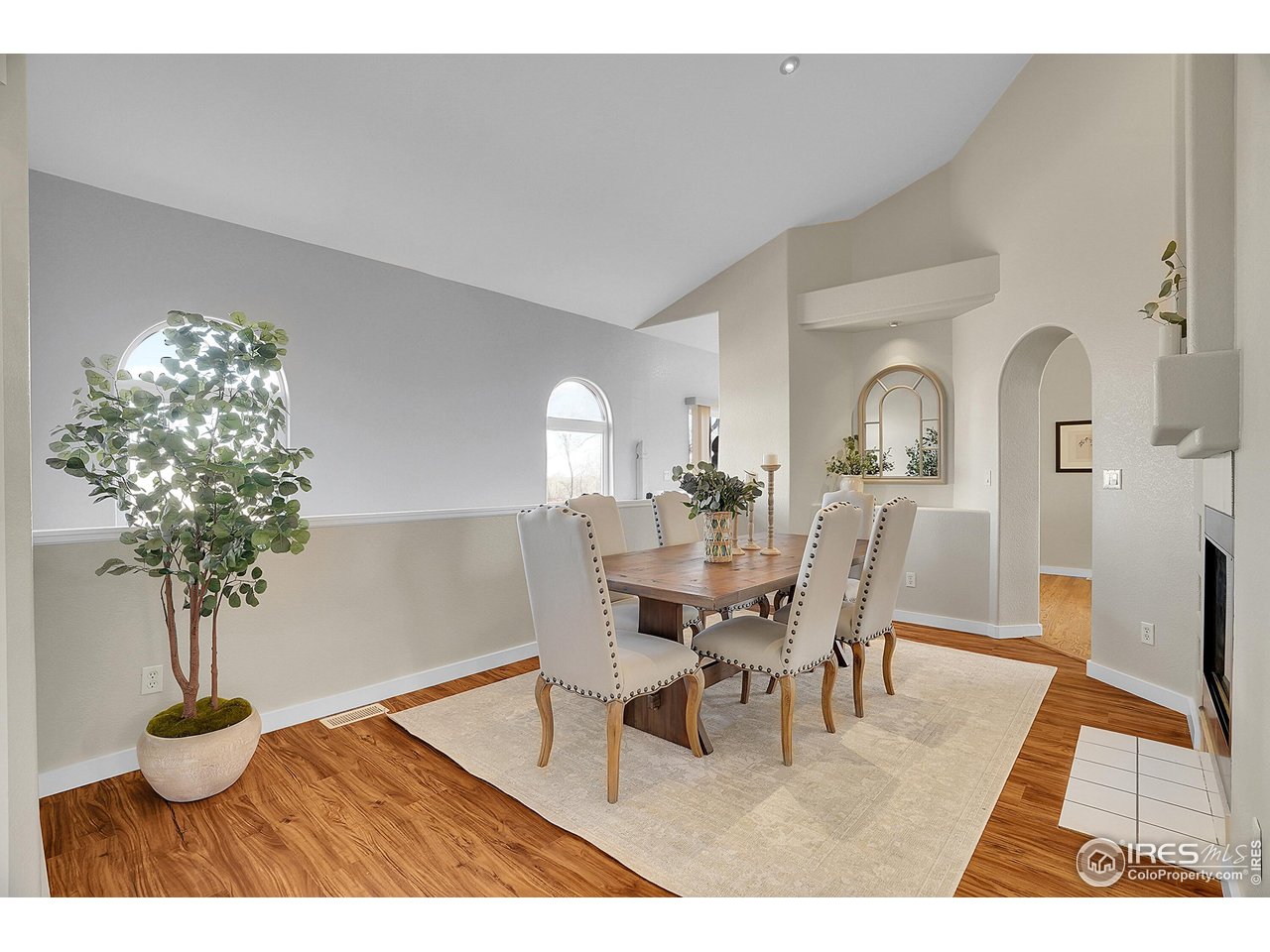 410 High Court Fort Collins, CO 80521 - Photo 11 of 37 a dining room with furniture and wooden floor