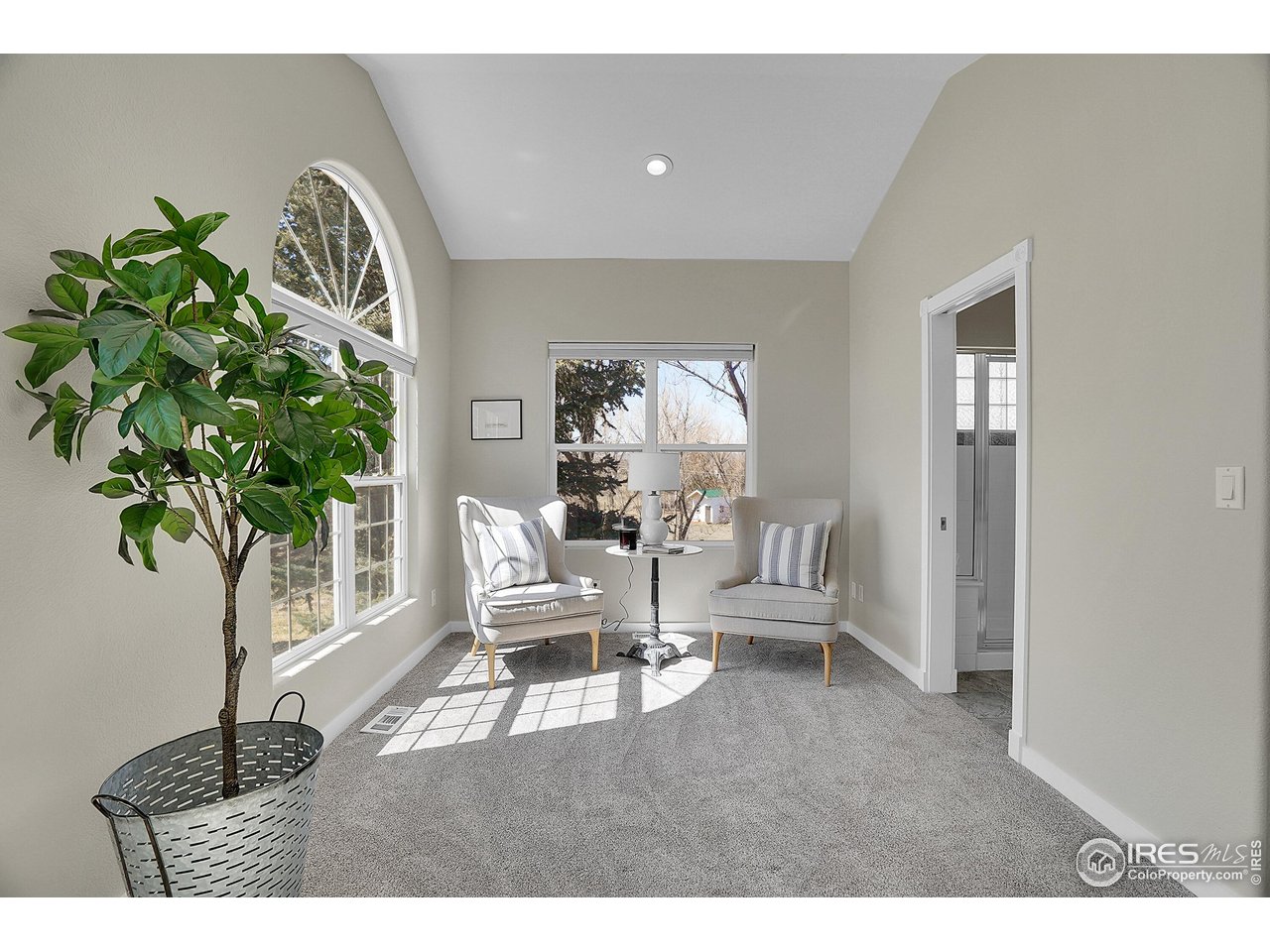 410 High Court Fort Collins, CO 80521 - Photo 14 of 37 a view of living room filled with furniture and a potted plant