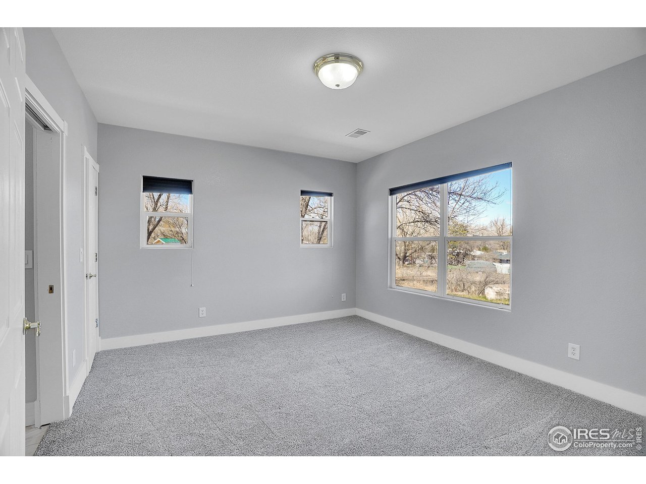 410 High Court Fort Collins, CO 80521 - Photo 25 of 37 a view of an empty room with a window