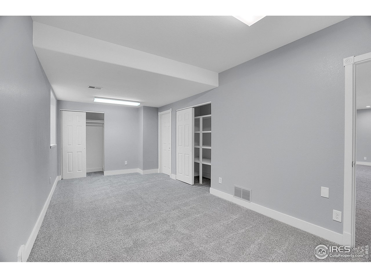 410 High Court Fort Collins, CO 80521 - Photo 27 of 37 a view of an empty room with a closet