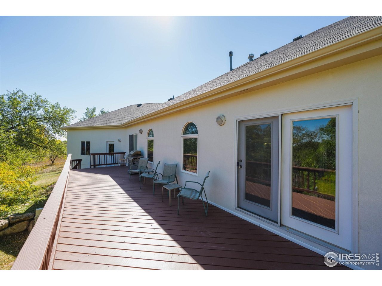 410 High Court Fort Collins, CO 80521 - Photo 28 of 37 a front view of a house with a yard