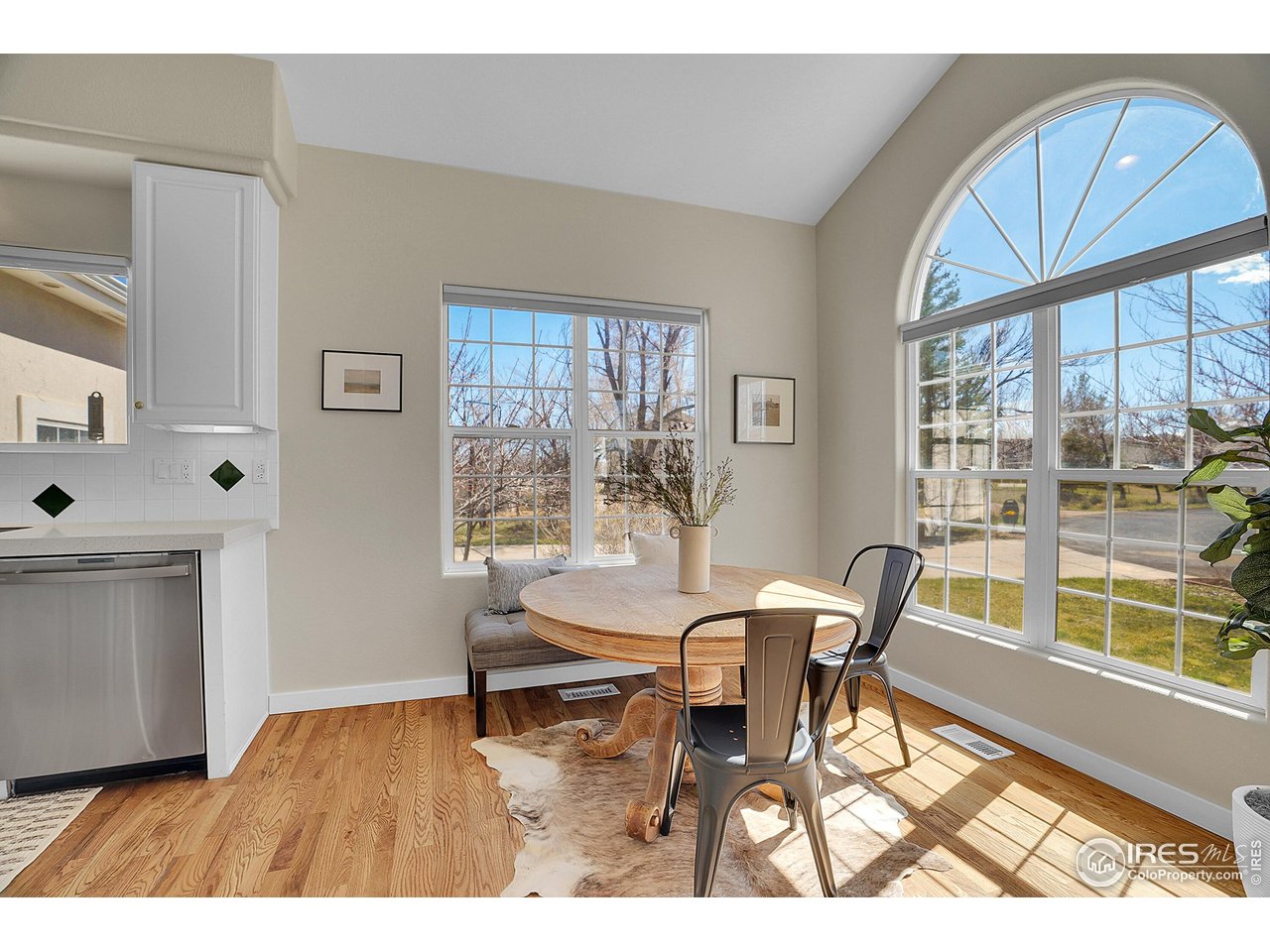 410 High Court Fort Collins, CO 80521 - Photo 10 of 37 a dining room with furniture and wooden floor