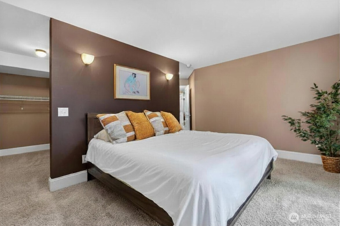 45 Cascade Lane Bellingham, WA 98229 - Photo 20 of 40 a bedroom with a bed and potted plant
