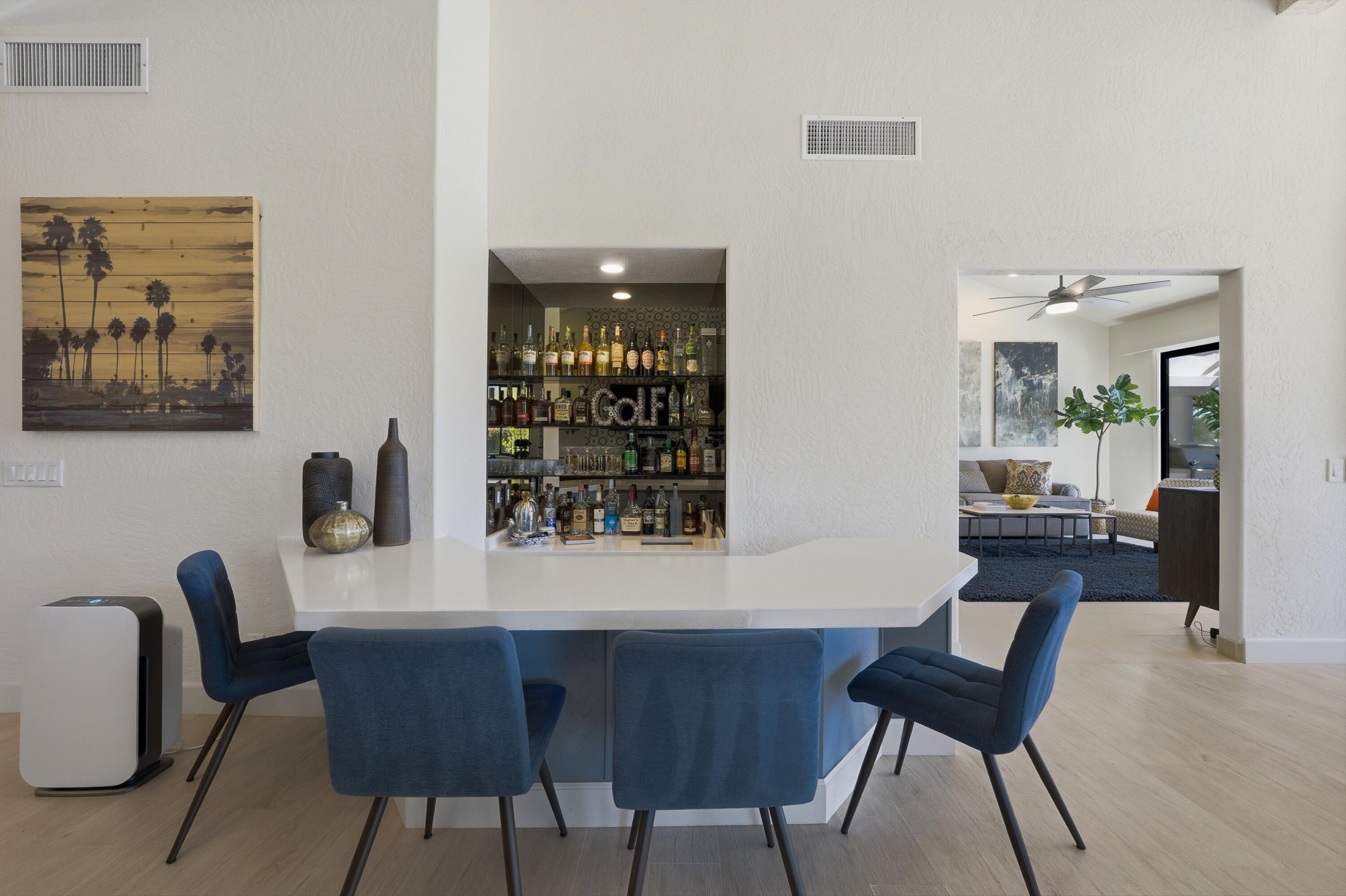 54672 Inverness Way La Quinta, CA 92253 - Photo 15 of 49 a dining room with furniture and window