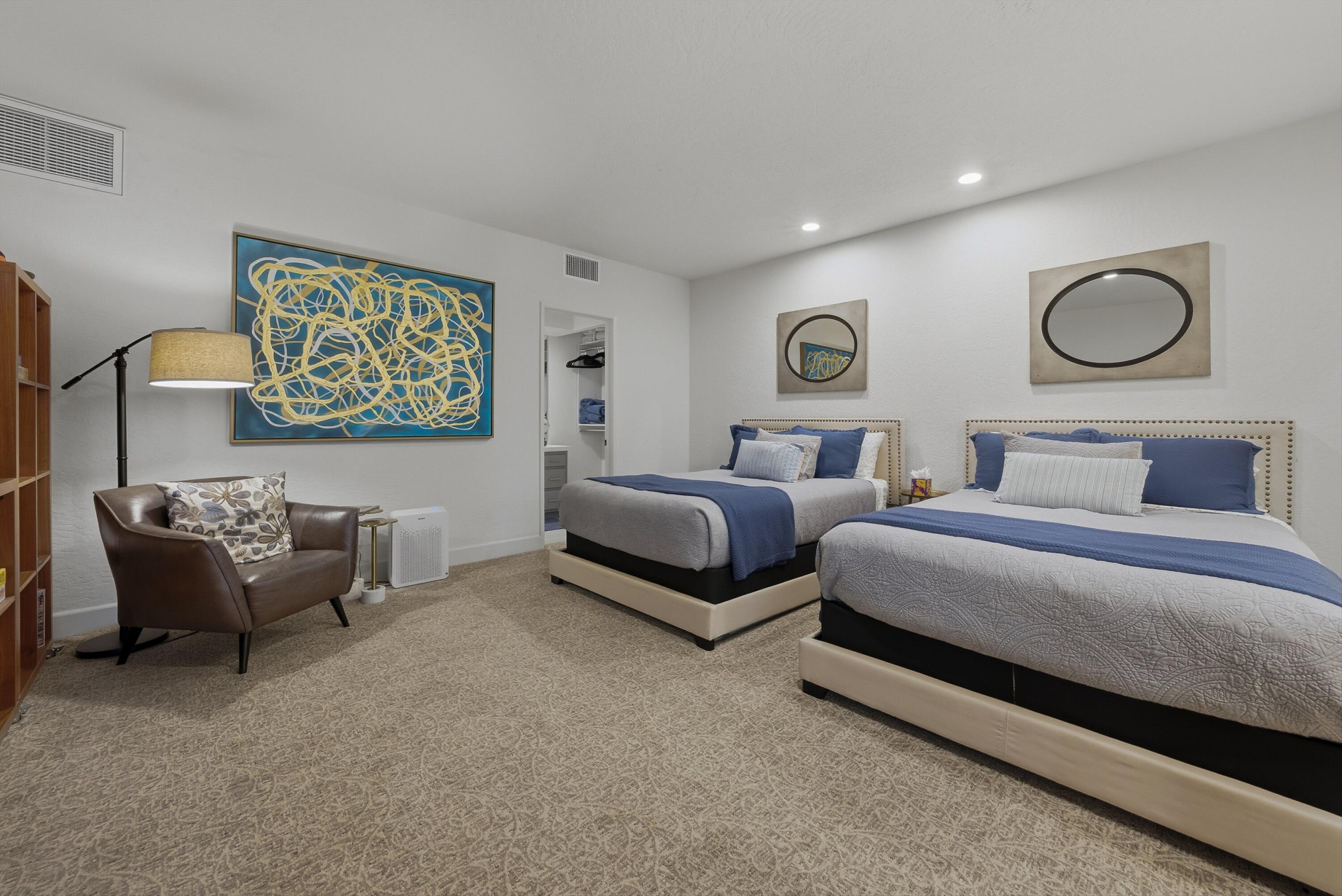 54672 Inverness Way La Quinta, CA 92253 - Photo 23 of 49 a bedroom with bed and a couch