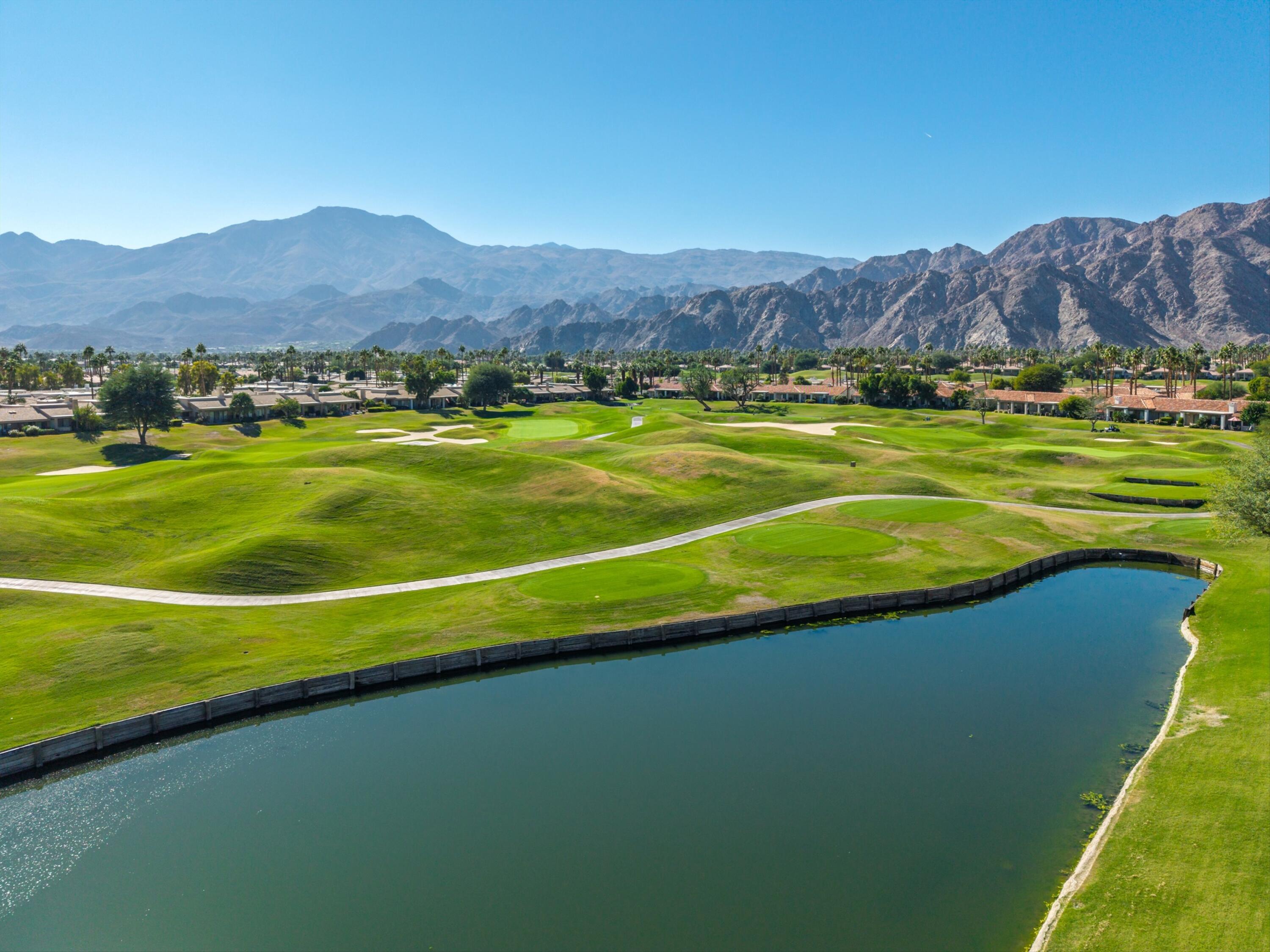 54672 Inverness Way La Quinta, CA 92253 - Photo 43 of 49 a view of a city with mountains in the background