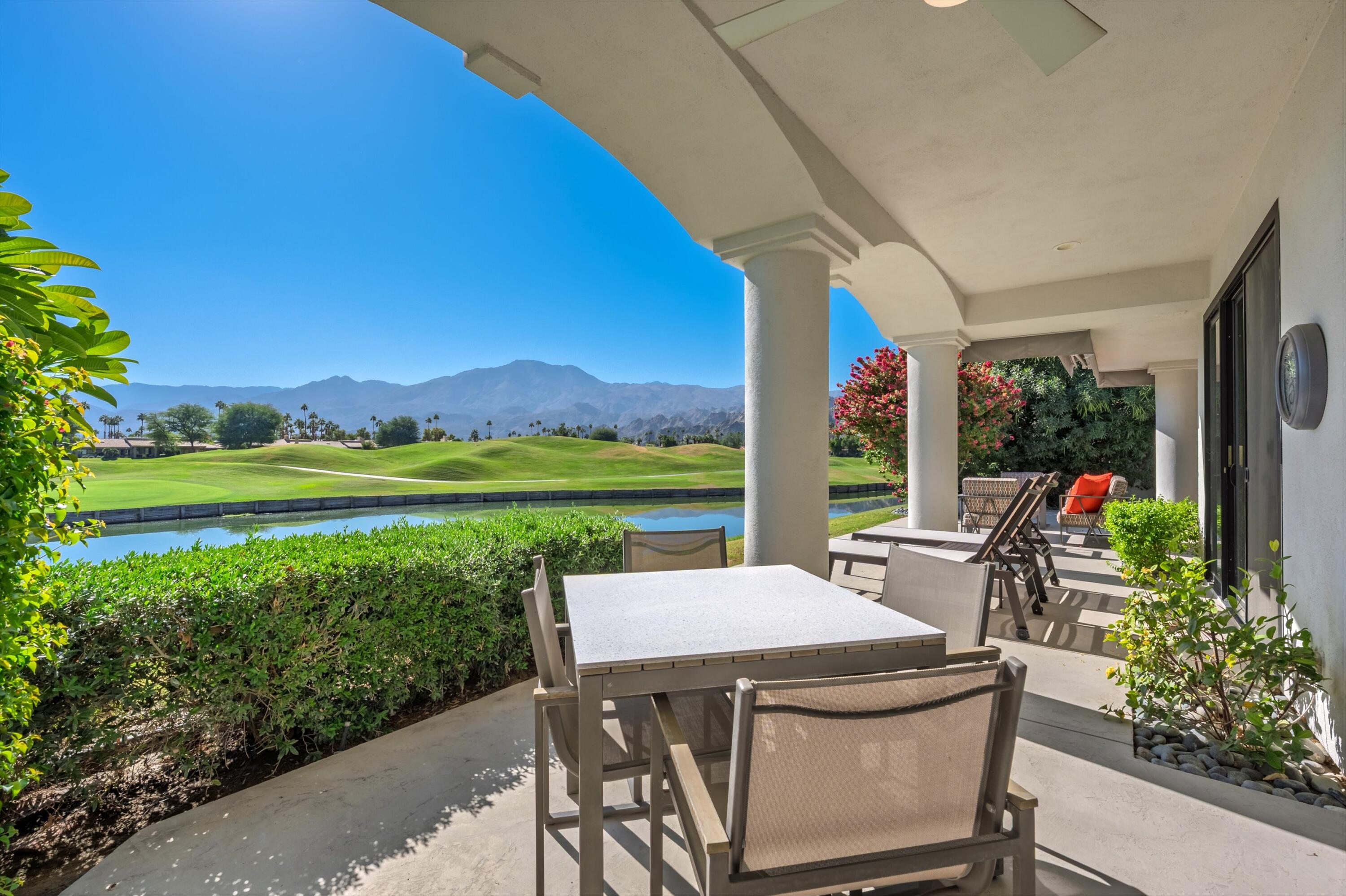 54672 Inverness Way La Quinta, CA 92253 - Photo 46 of 49 a view of an outdoor sitting area with furniture and garden