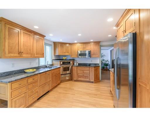 17 Towne Road Boxford, MA 01921 - Photo 3 of 28 a kitchen with stainless steel appliances granite countertop a refrigerator a sink a stove and oven