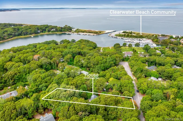 a sign board with a small yard