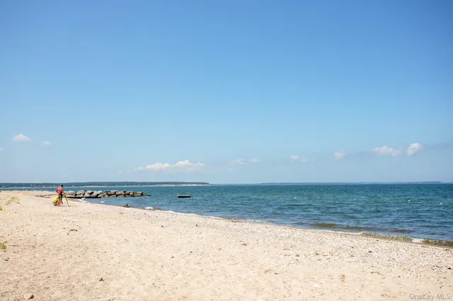 a view of a park with swings and slides