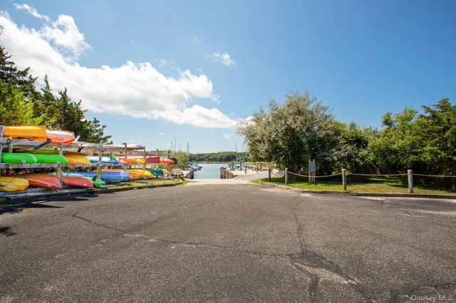 a view of swimming pool with seating space