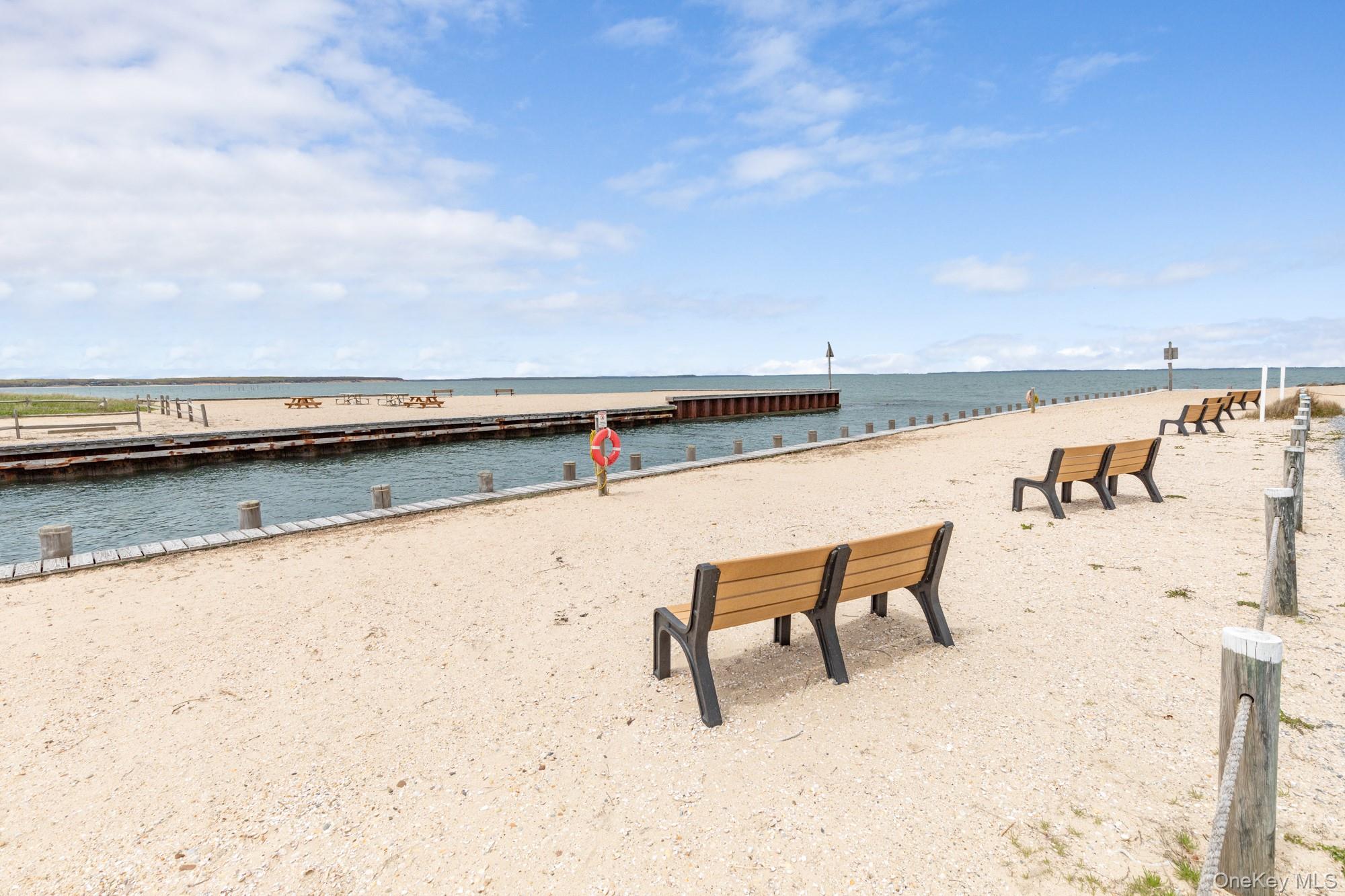 18 Norfolk Drive Springs, NY 11937 - Photo 21 of 26 a view of swimming pool with seating space