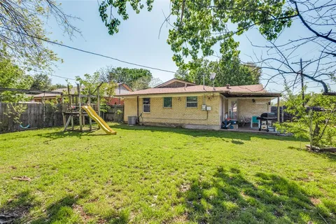 a view of a house with a swimming pool