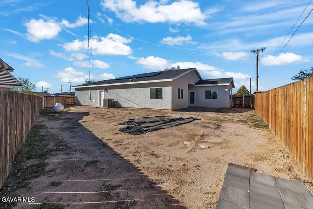 a view of a house with a patio