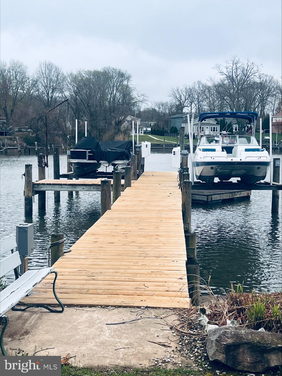 2043 Sue Avenue Baltimore, MD 21221 - Photo 26 of 26 a lake view with boat and palm trees