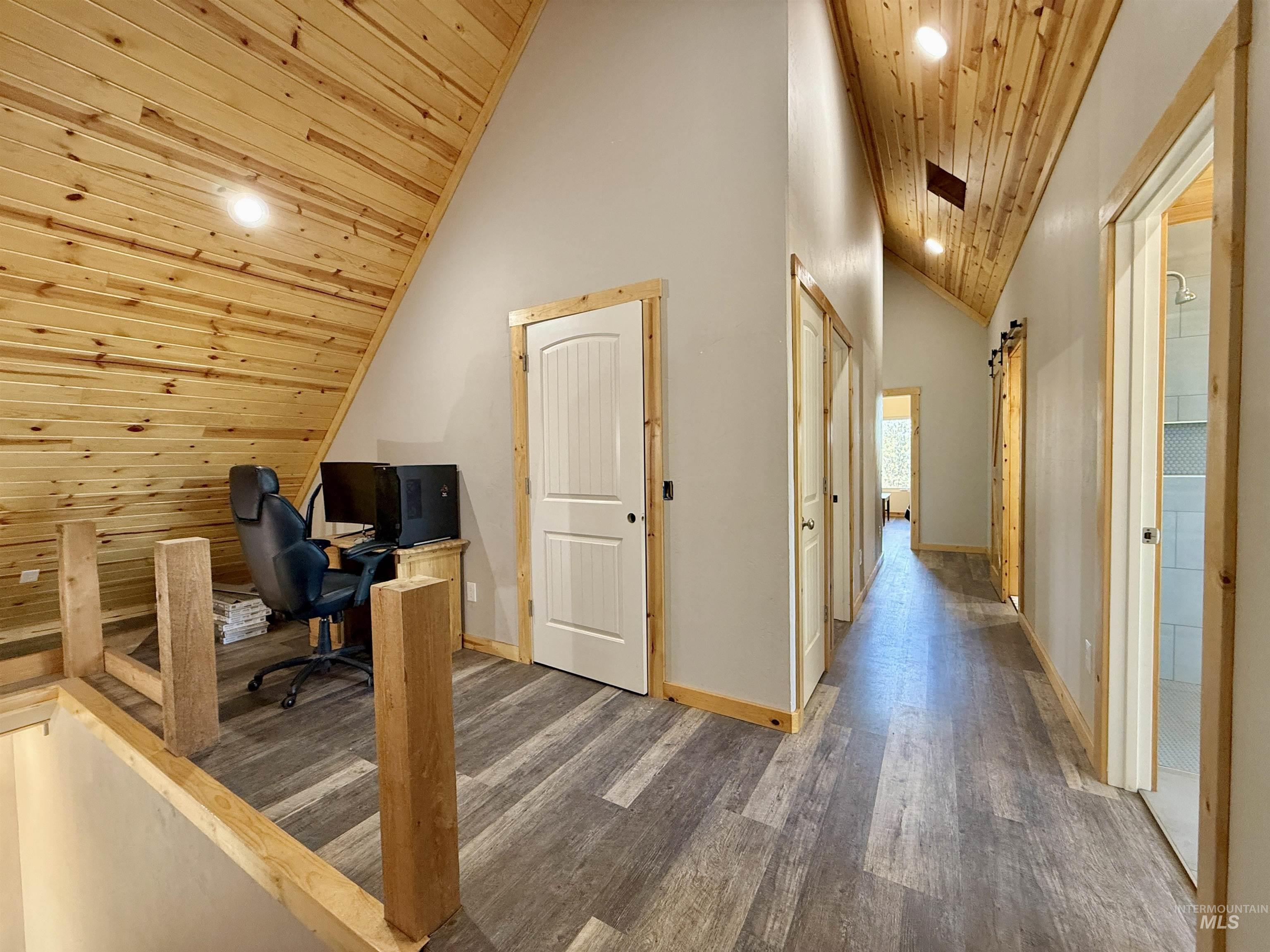 929 Mt Idaho Grade Road Grangeville, ID 83530 - Photo 14 of 47 Office space featuring wooden ceiling, a barn door, wood finished floors, high vaulted ceiling, and recessed lighting