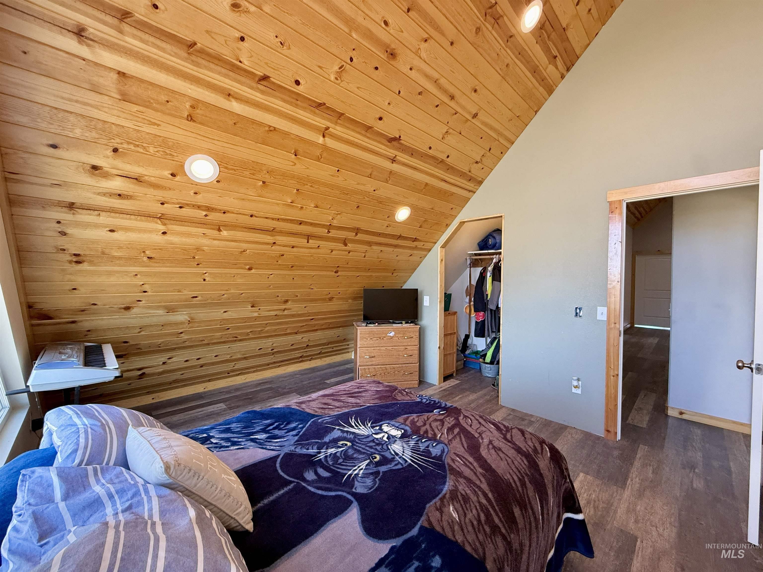 929 Mt Idaho Grade Road Grangeville, ID 83530 - Photo 23 of 47 Bedroom featuring lofted ceiling, wooden ceiling, wood finished floors, and recessed lighting