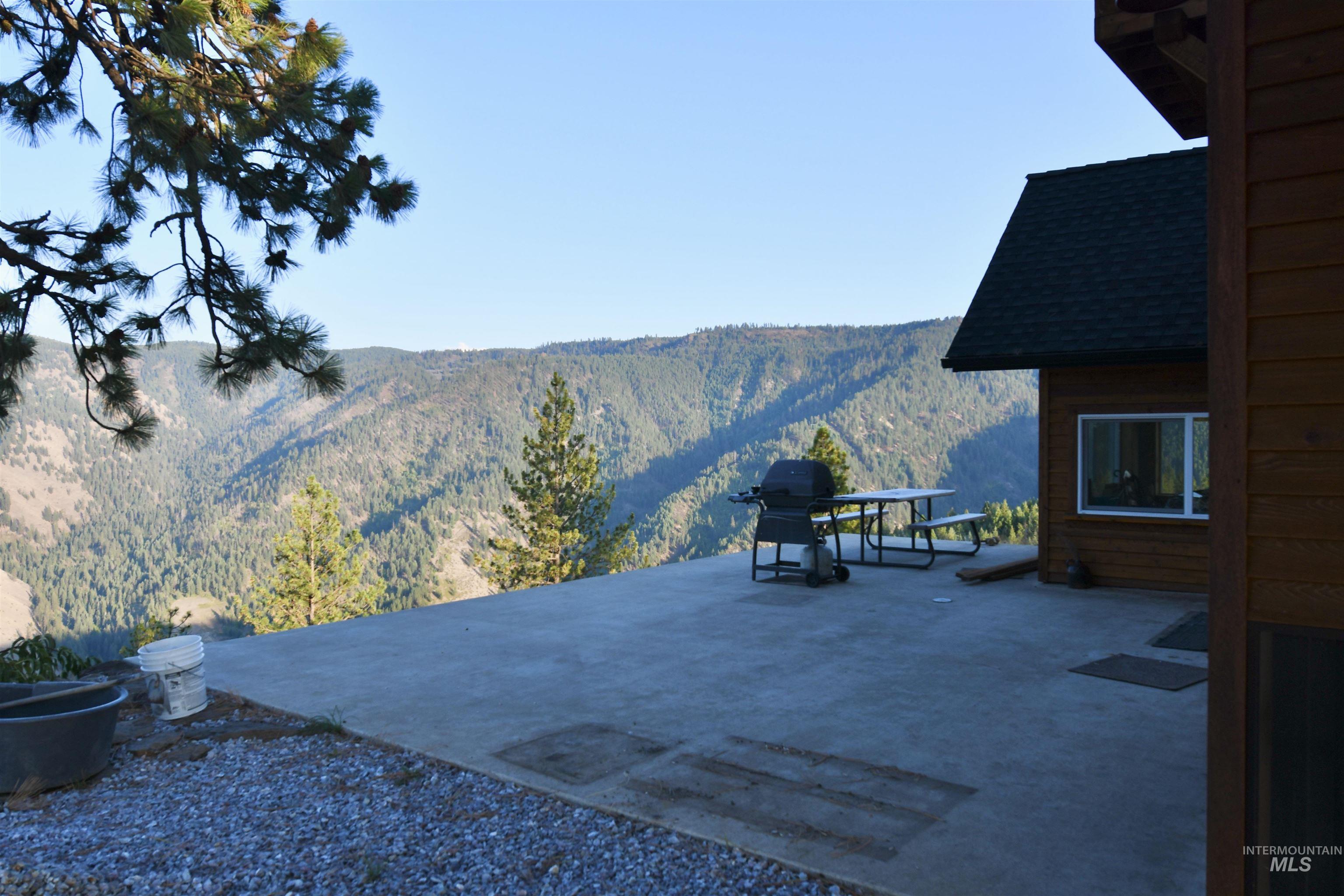929 Mt Idaho Grade Road Grangeville, ID 83530 - Photo 30 of 47 View of patio featuring a mountain view and grilling area