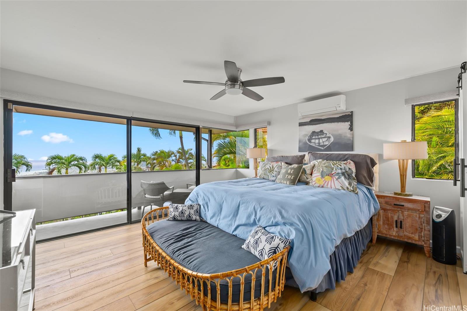 1868 Kihi Street Honolulu, HI 96821 - Photo 13 of 20 a bedroom with a bed and a large window