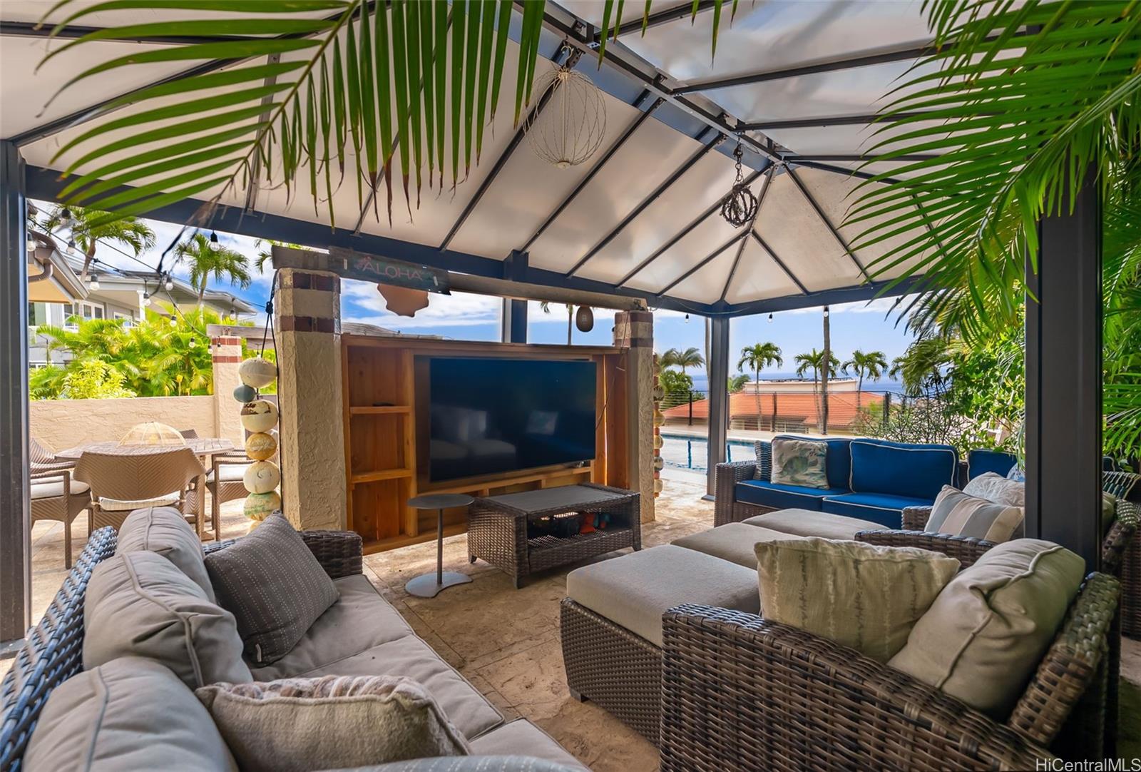 1868 Kihi Street Honolulu, HI 96821 - Photo 9 of 20 a living room with furniture and a flat screen tv
