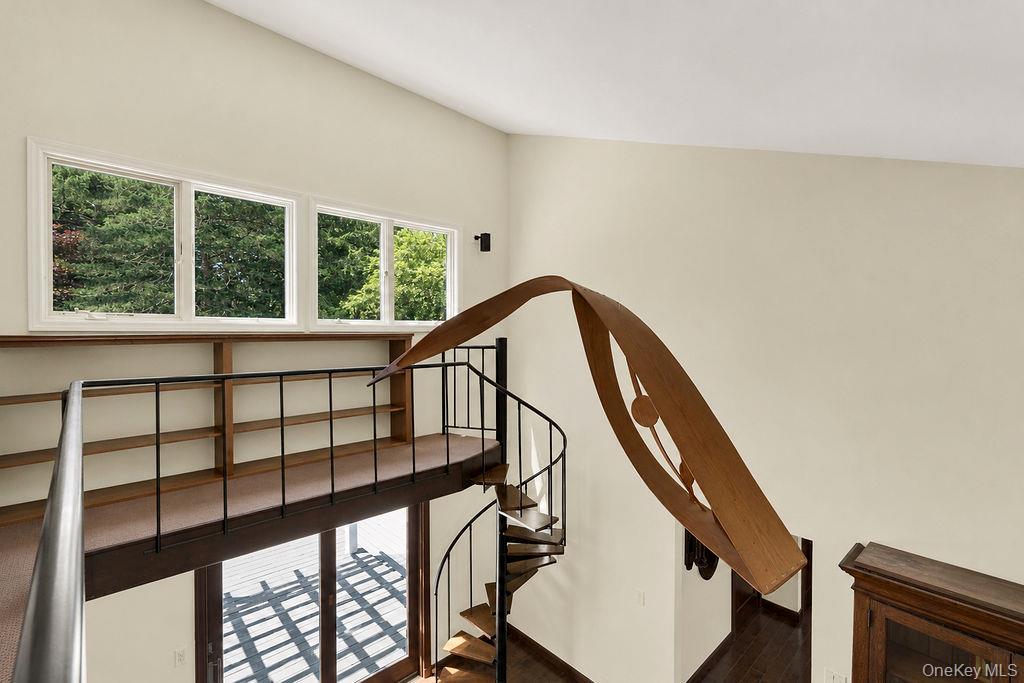 7 Tuthill Lane Remsenburg, NY 11960 - Photo 11 of 43 Spiral staircase to the loft