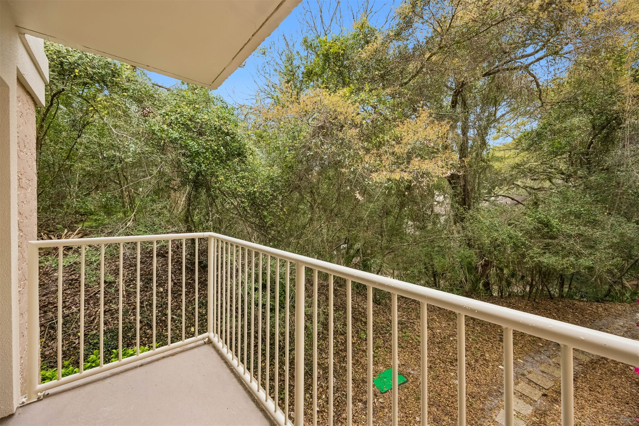 2109 Beachwood Road, Unit 2109 Fernandina Beach, FL 32034 - Photo 5 of 31 a balcony with trees in front of it