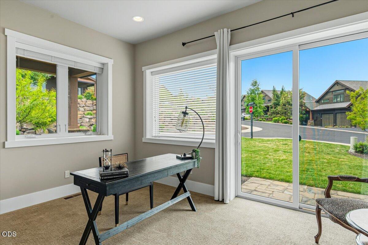 61333 Kindle Rock Loop Bend, OR 97702 - Photo 14 of 53 a view of a room that has a bench and wooden floor