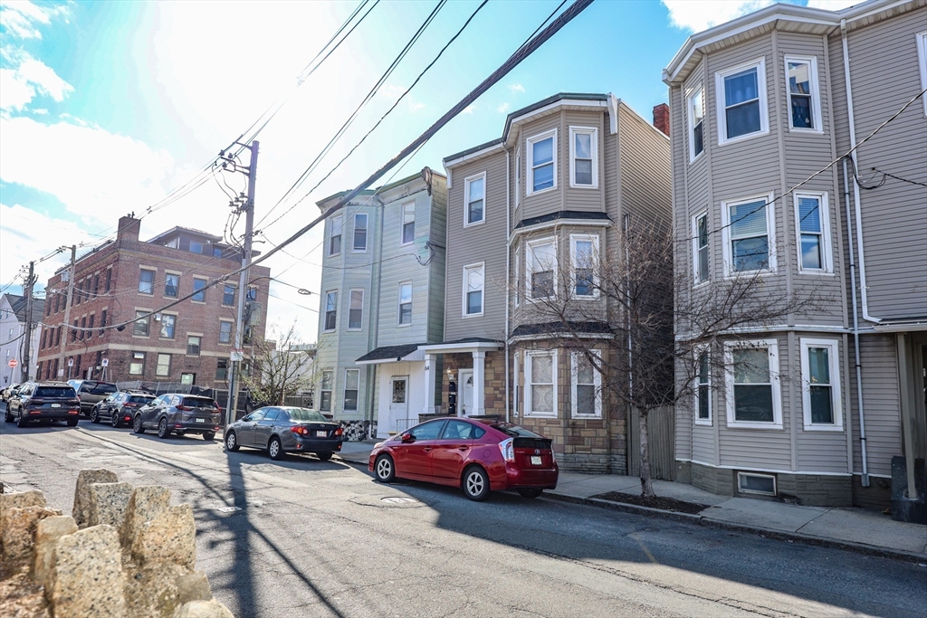 64 Bremen Street Boston, MA 02128 - Photo 3 of 42 a houses on the side of a street