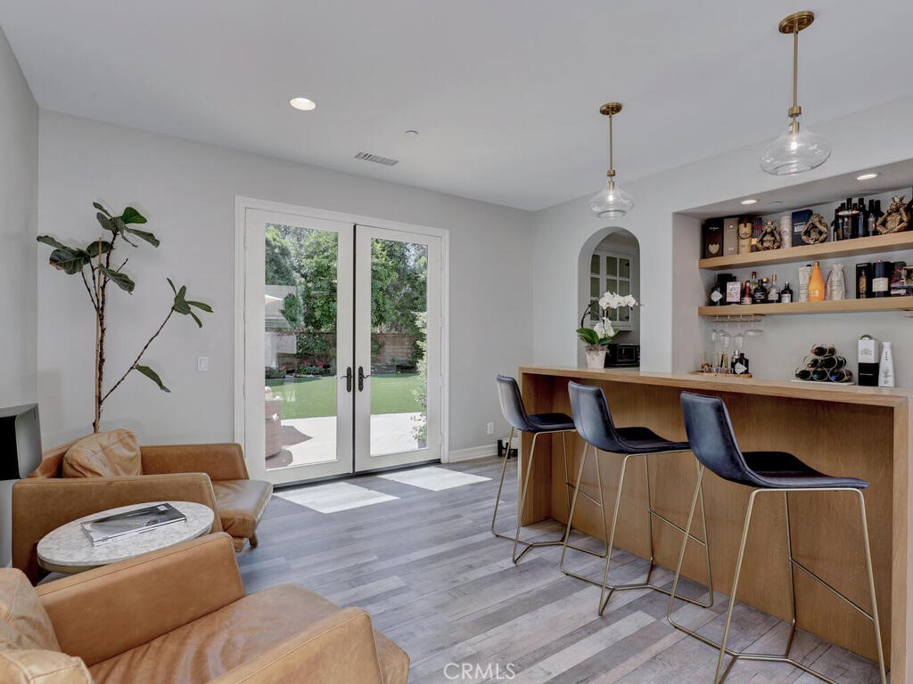 1 Lennox Court Ladera Ranch, CA 92694 - Photo 11 of 68 The wine/beverage room with a great serving bar and french doors opening to the lawn.