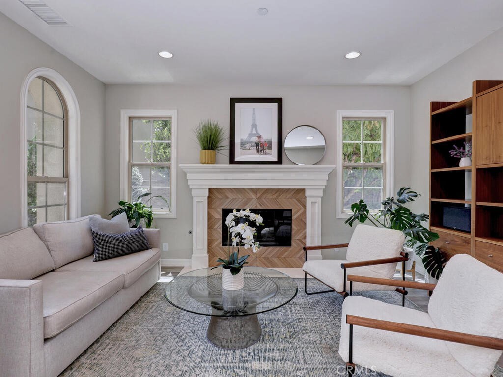 1 Lennox Court Ladera Ranch, CA 92694 - Photo 8 of 68 A seating area/ living room with fireplace is a perfect spot for guests and to just relax.