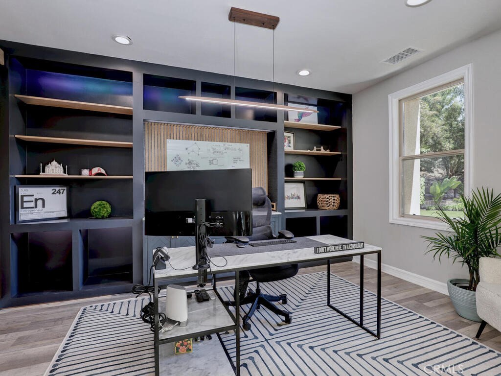 1 Lennox Court Ladera Ranch, CA 92694 - Photo 9 of 68 The office includes a custom backdrop with storage and shelving. Ideally located at the entrance to the home.