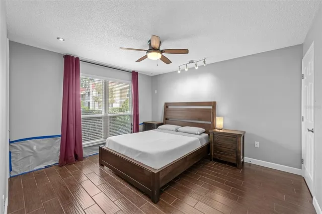 a view of a swimming pool with a lounge chairs