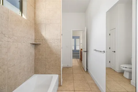 a bathroom with a sink and toilet