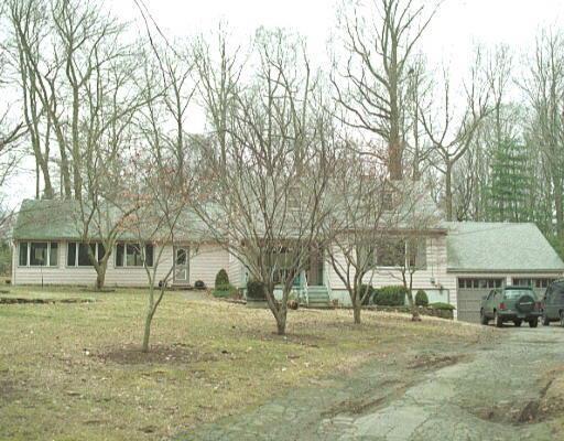 27 A Old Green Road Trumbull, CT 06611 - Photo 1 of 1 a view of yard in front of house with trees