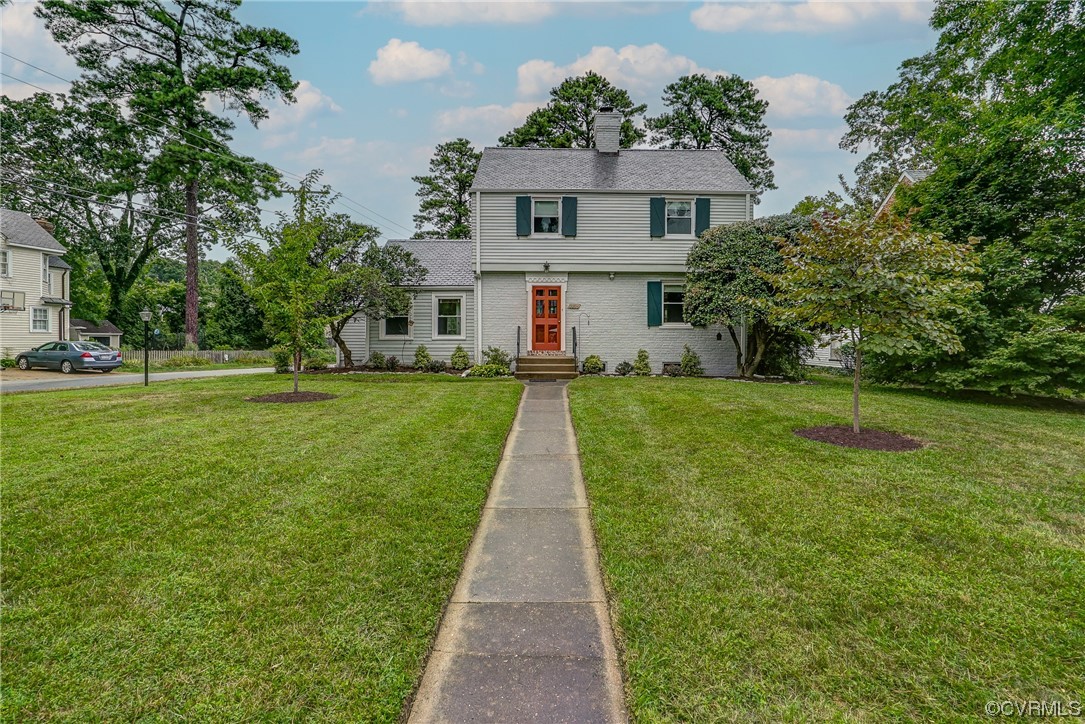 front view of a house with a yard