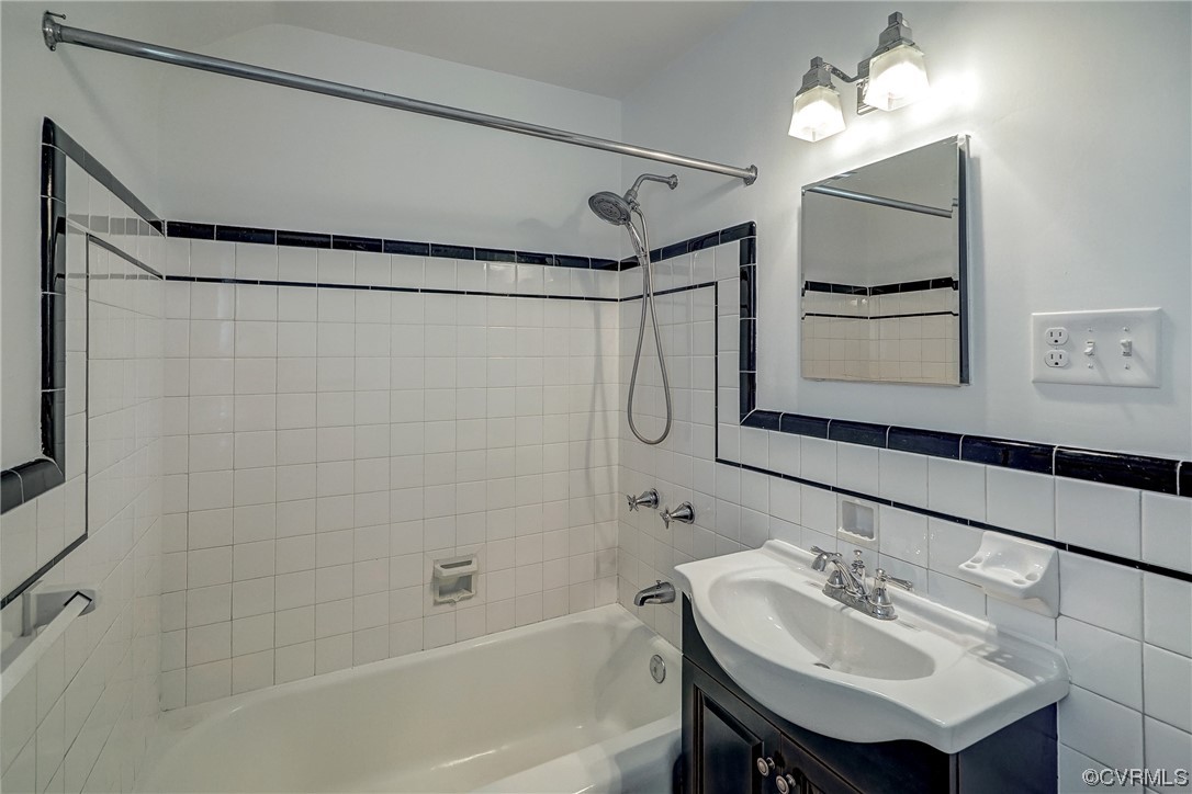 5304 Ditchley Road Richmond, VA 23226 - Photo 24 of 41 a bathroom with a sink shower and a mirror