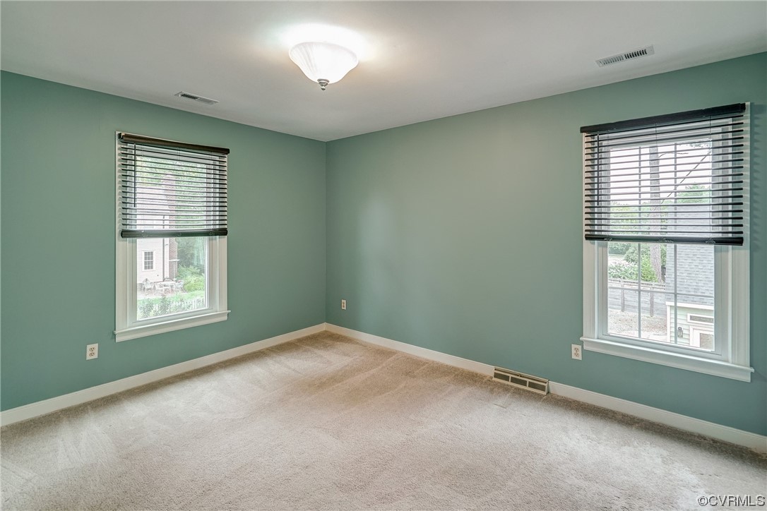 5304 Ditchley Road Richmond, VA 23226 - Photo 28 of 41 an empty room with a window