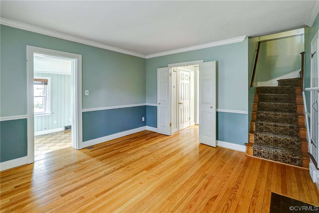 5304 Ditchley Road Richmond, VA 23226 - Photo 3 of 41 wooden floor in an empty room with a window