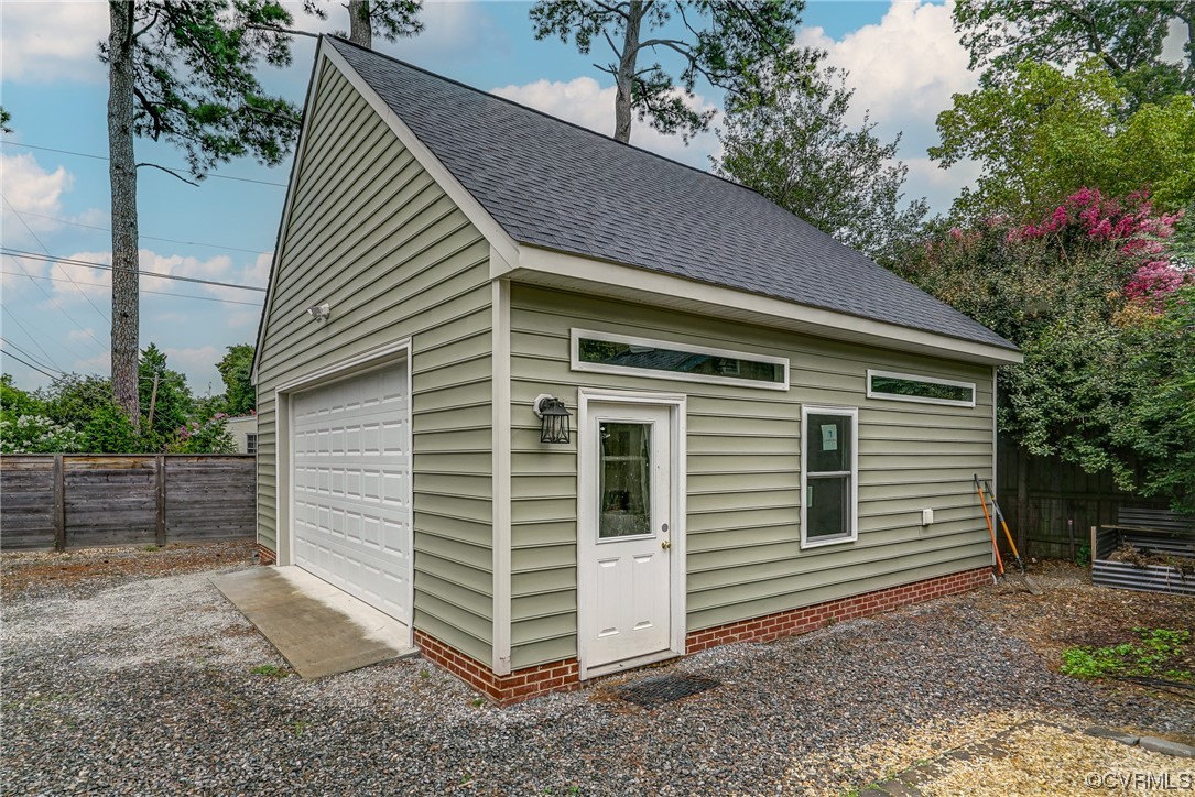 5304 Ditchley Road Richmond, VA 23226 - Photo 35 of 41 a view of a house with a yard and garage