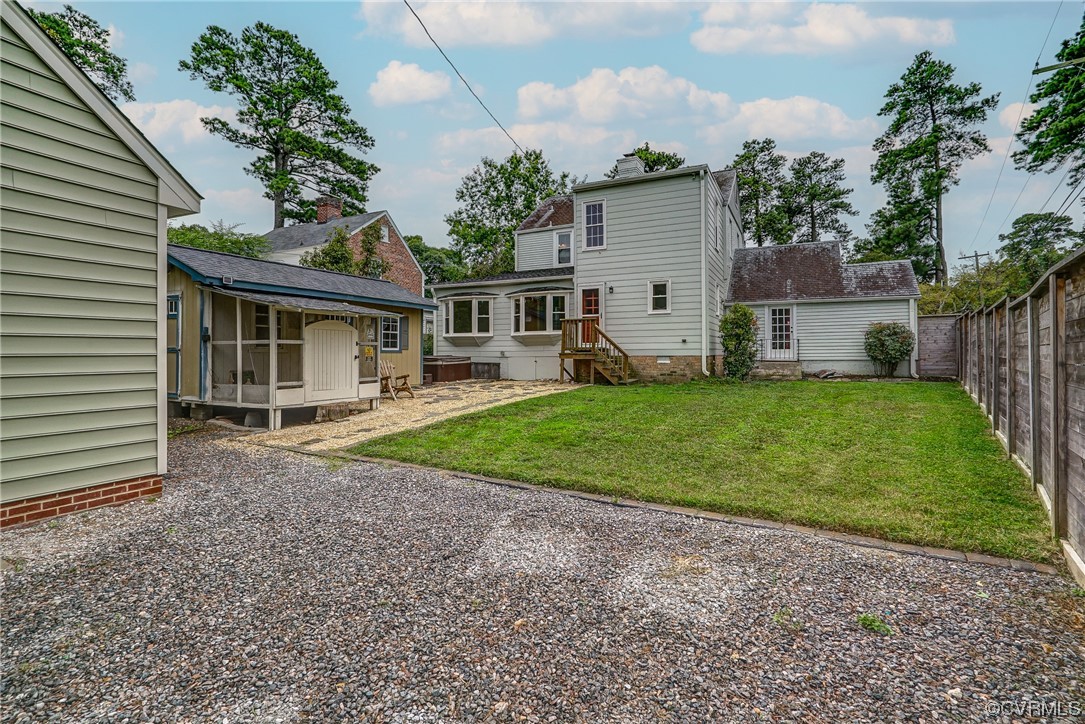 5304 Ditchley Road Richmond, VA 23226 - Photo 37 of 41 a view of a house with a yard and plants