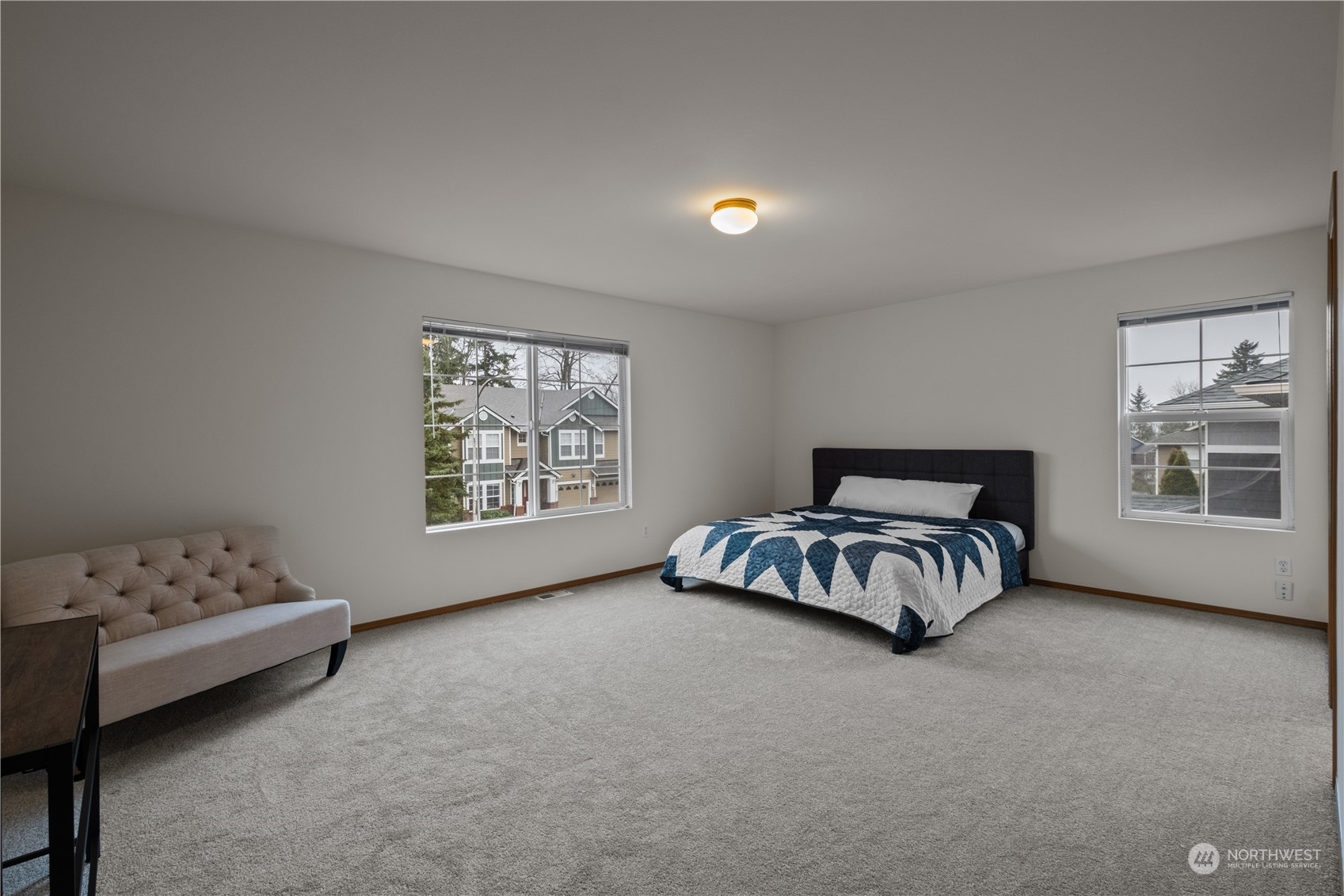 2306 Southeast 3rd Street Renton, WA 98056 - Photo 16 of 34 a bedroom with a bed and a window